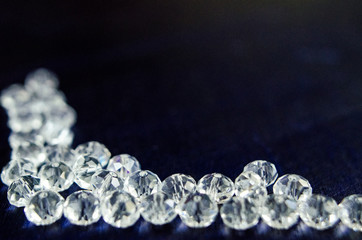 diamonds crystal glass beads on blue background