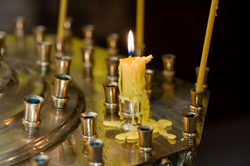 Obraz na płótnie Canvas Church candles, candle fire, flame, church service.