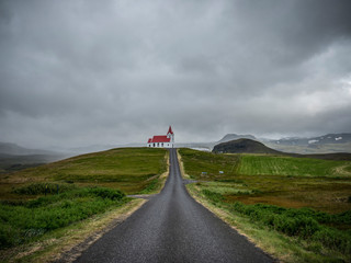Red roofed church near Olafsvik