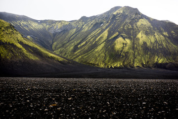 Moss covered black volcanic mountains near Langisjor Iceland