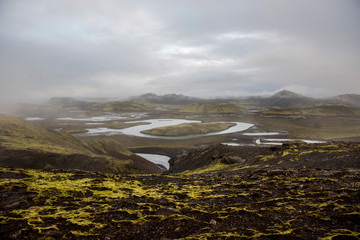 River running through Langisjor Valley in Iceland on a misty date