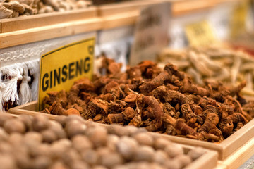 Multi-colored dried fruits and tea in the oriental bazaar.