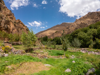 Fototapeta na wymiar High Atlas Mountains against blue sky in Imlil, Morocco. Beautiful landscape of Nature in North Africa 