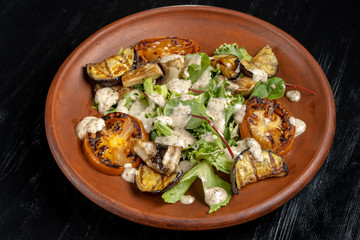 Grilled vegetable salad. Salad of barbecued zucchini, eggplant, onion.