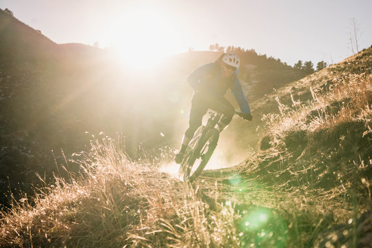 A mountain biker on Grubstake Loop trail in the Apex Open Space park in Golden, Colorado.
