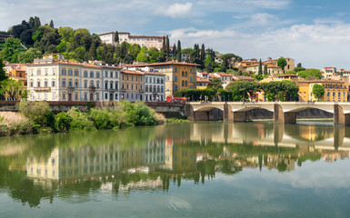 Panoramic summer view of Ponte alle Grazie with river Arno in Florence, Italy