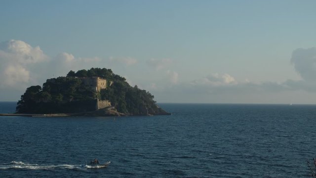 Boat passing in front of Fort de Br&eacute;gan&ccedil;on France bormes les mimosas 