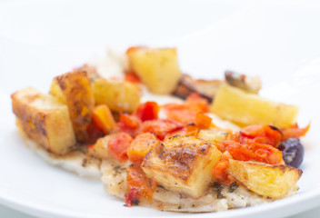 fish with potatoes, baked sea bream