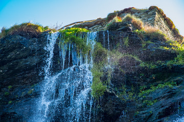 A small cascading waterfall in Cornwall
