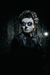 Fototapeta na wymiar halloween dark gothic scary make up. Santa Muerte concept.