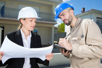 businesswoman and worker discussing new project