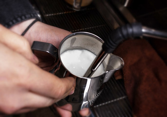 Making coffee in coffeeshop or cafe closeup