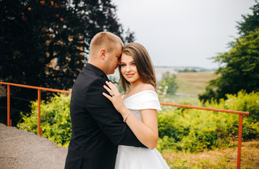 Fototapeta premium Beautiful couple hugging each others