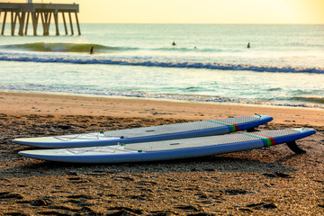 Wilmington,North Carolina,USA,October 2019,Stack of colorful surfboards on a tropical beach by the ocean 