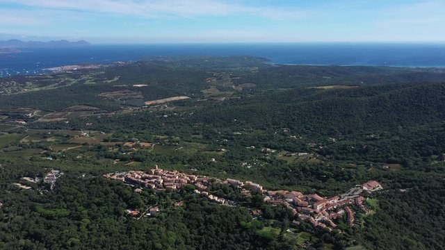 Gassin aerial view with Saint Tropez in background sunny day mediterranean sea vacation