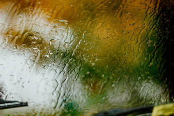 texture of raindrops on glass autumn trees