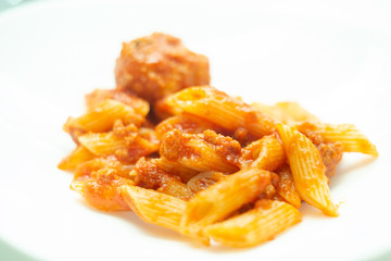 Italian pasta with tomato sauce and meatballs