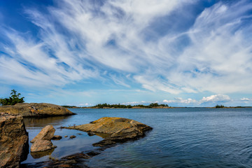 Fototapeta na wymiar A view over St Anna archipelago with gneiss rocks in the Baltic Sea, Sweden