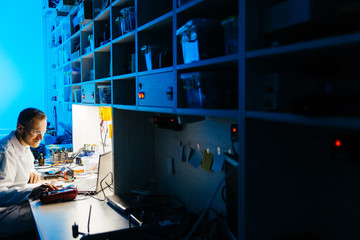 Man working in electronic research workshop