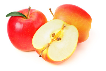 red apples with slices and green leaves isolated on a white background