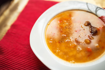 Image of tasty homemade soup on table