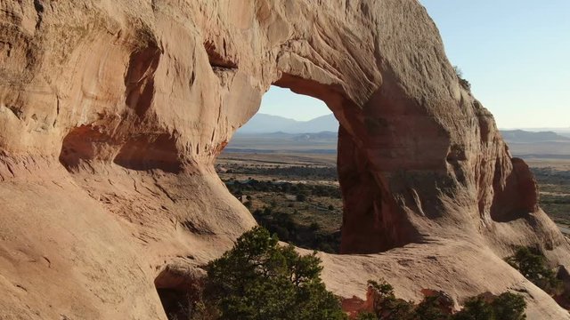 Wilson Arch Flying Through Aerial Shot of Rock Formation Utah 04