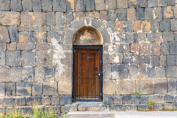 Western Asia, Eurasia, South Caucasus, Republic of Armenia. Sevan. Door on the church of Surp Arakelots at the Sevanavank Monastery complex on Lake Sevan.