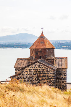 Western Asia, Eurasia, South Caucasus, Republic of Armenia. Sevan. The church of Surp Astvatsatsin at the Sevanavank Monastery complex on Lake Sevan.