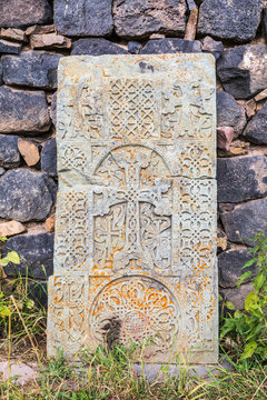 Western Asia, Eurasia, South Caucasus, Republic of Armenia. Sevan. Carved stone tablet outside of the church of Surp Arakelots at the Sevanavank Monastery complex on Lake Sevan.