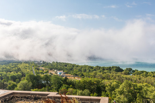 Western Asia, Eurasia, South Caucasus, Republic of Armenia. Sevan. View across Lake Sevan from the Sevanavank Monastery complex.