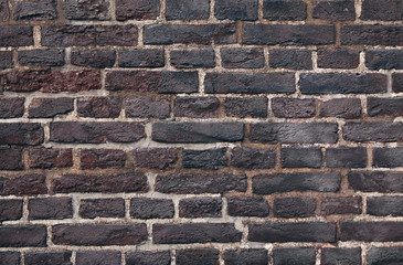 Close up dark brick old textured wall background