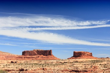 Fototapeta premium Monitor and Merrimac sandstone buttes in Grand County, Utah. American landscape.