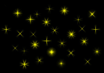 set of yellow gold star rays on black background