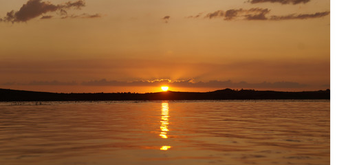 Wonderful evening sunset on a mountain lake