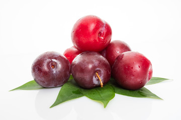 fresh plum isolated on white background