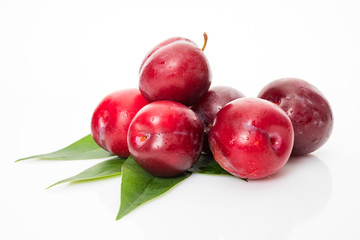 fresh plum isolated on white background