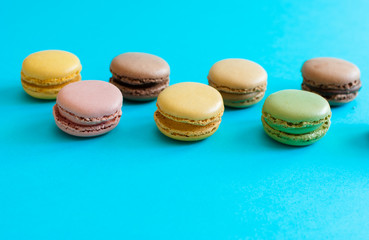 French macarons dessert on a blue background
