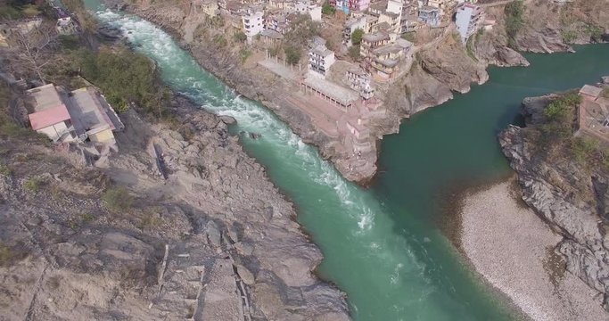 Aerial shot of the rapids of the Ganges under the city of Rishikesh in India.
