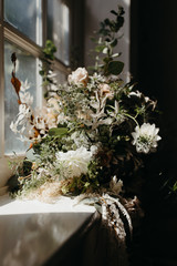 Obraz na płótnie Canvas bouquet in window