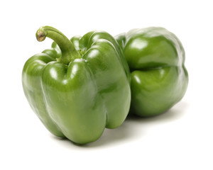fresh green bell pepper (capsicum) on a white background