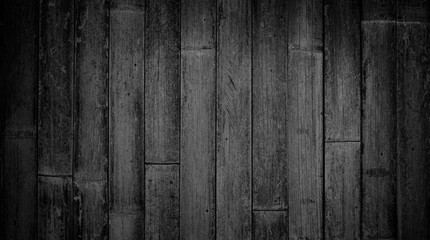 Rustic black and white vintage textured wood bamboo background with rough grain. Vertical parallel boards.