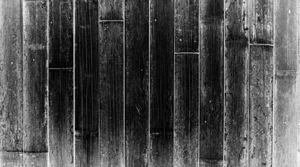 Rustic black and white vintage textured wood bamboo background with rough grain. Vertical parallel boards.