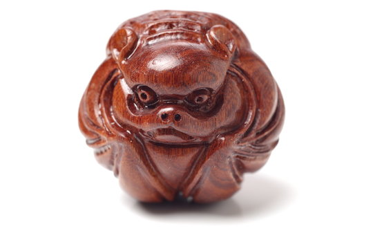Wood carving monkey on the white background