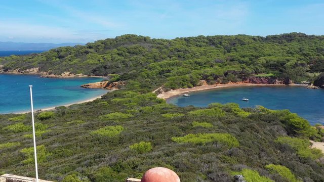 Aerial back traveling over the Fortress Langoustier beach Porquerolles France Hy&egrave;res island