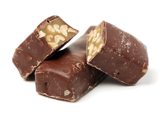 Chocolate peanut candy on white background