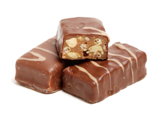 Chocolate peanut candy on white background