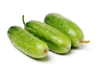 Green cucumber on the white background