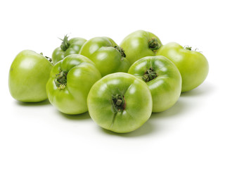 fresh green tomato isolated on white background