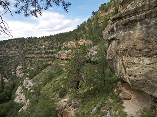 Cliff Dwellings carved in rock on Walnut Canyon stone wall, Arizona