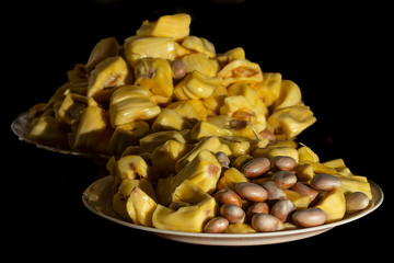 Jackfruit (Artocarpus heterophyllus), a fruit processing where seeds and flesh can be seen. It is the national fruit of Bangladesh and Sri Lanka and the largest fruit of the tree.